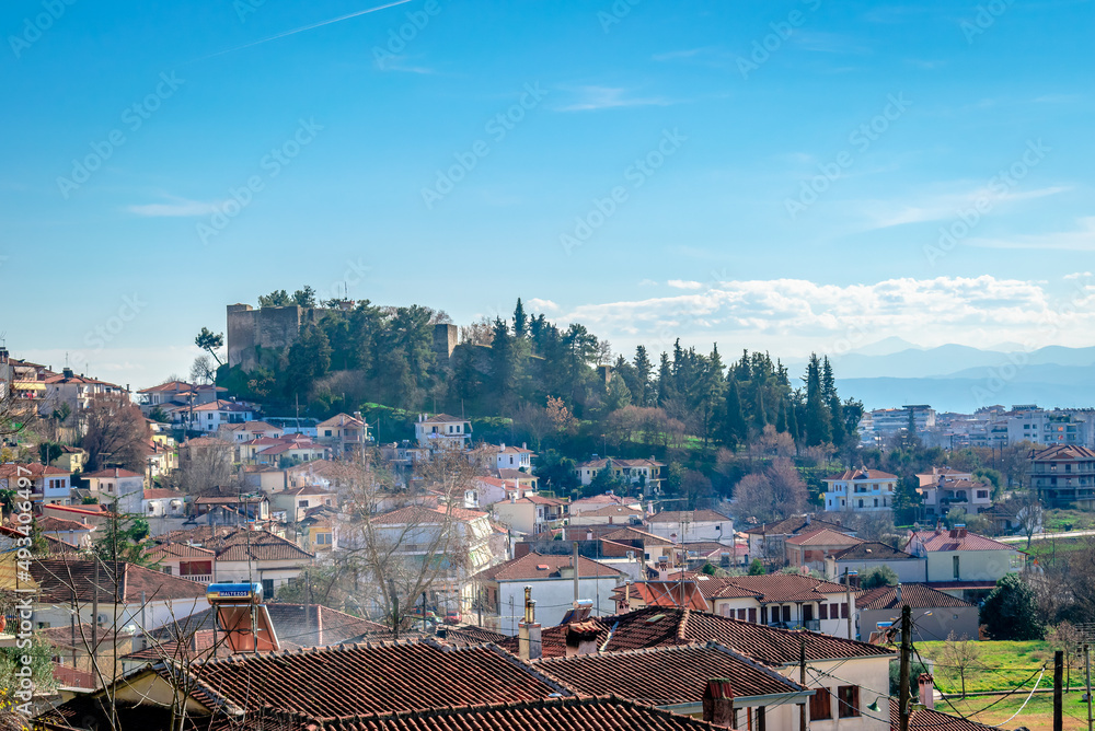 Panoramic view of the old town of Trikala, in Thessaly, Greece, with the hill of Profitis Ilias and the medieval byzantine castle. Panoramic view of the old town of Trikala, in Thessaly, Greece, with the hill of Profitis Ilias and the medieval byzantine castle.