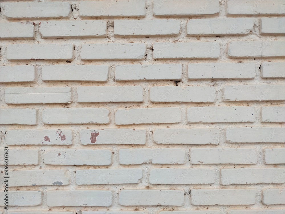 a beautiful white brick wall to serve as a background. a beautiful white brick wall to serve as a background.