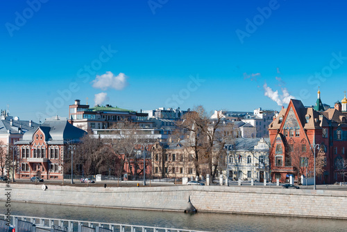 Moscow. Russia. Urban landscape. View of the Prechistenskaya embankment and the Moskva River photo