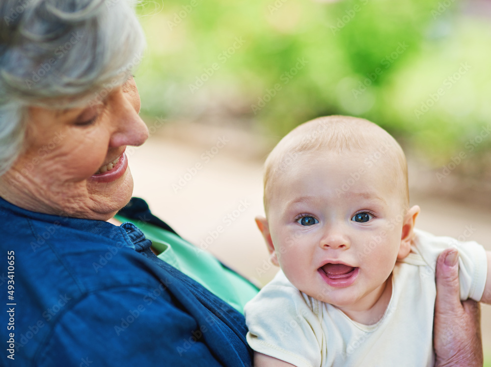 Naklejka premium Little boys are just superheroes in disguise. Cropped shot of a baby boy spending time outdoors with his grandmother.