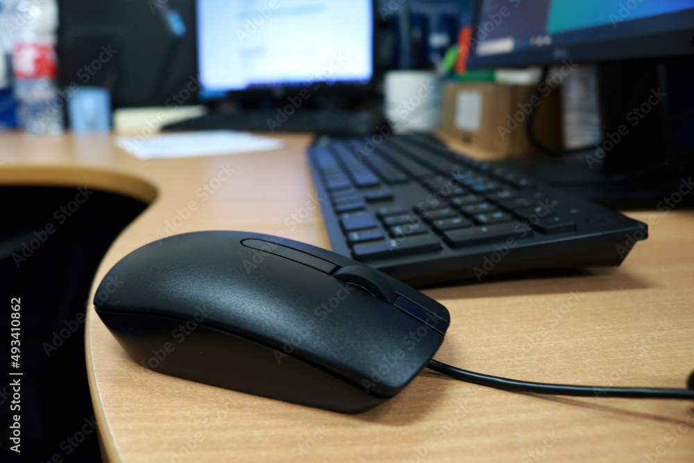 Mouse and keyboard on the office desk, mouse and keyboard are hardware parts of the computer Mouse and keyboard on the office desk, mouse and keyboard are hardware parts of the computer