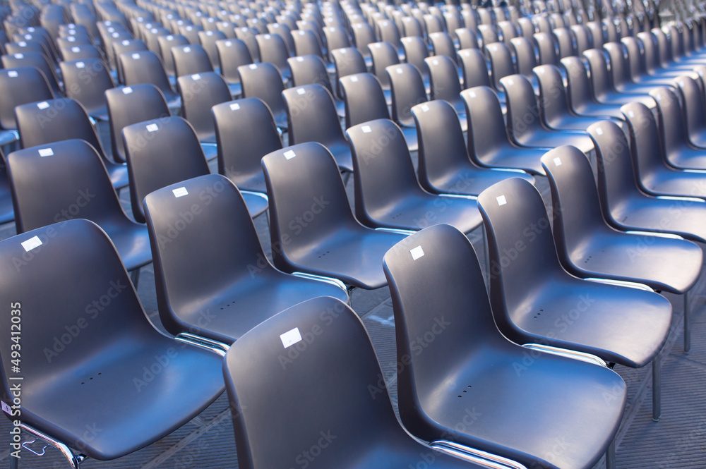 Fototapeta premium Seats in the cinema. Chairs in the conference room, many chairs for meetings and training, chairs in the stadium for a large audience.