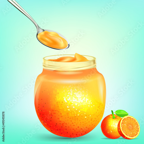 Orange cream or milk fruit yogurt of Orange color in an open glass transparent jar on blue background. 