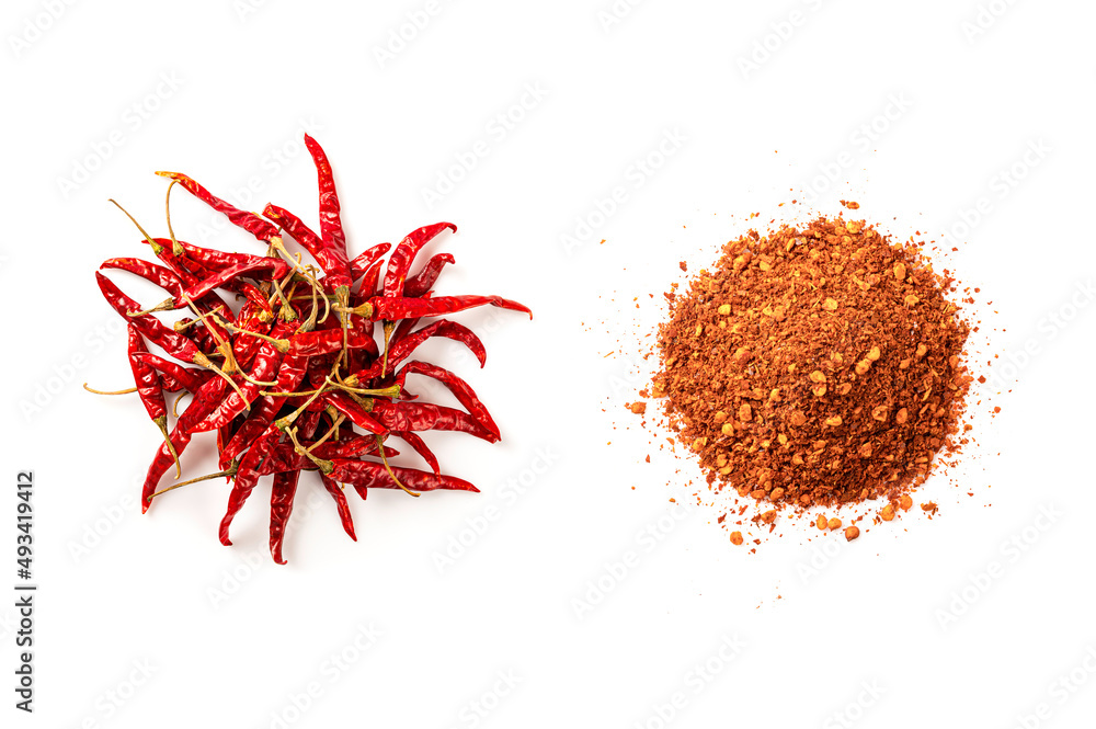Naklejka premium Red hot chili peppers with chili powder isolated on white background. Top view 
