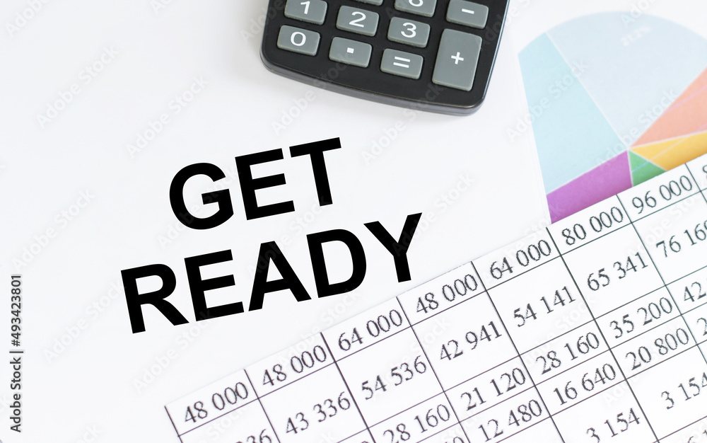 Notebook with GET READY word with office tools on white table. business conceptual Notebook with GET READY word with office tools on white table. business conceptual