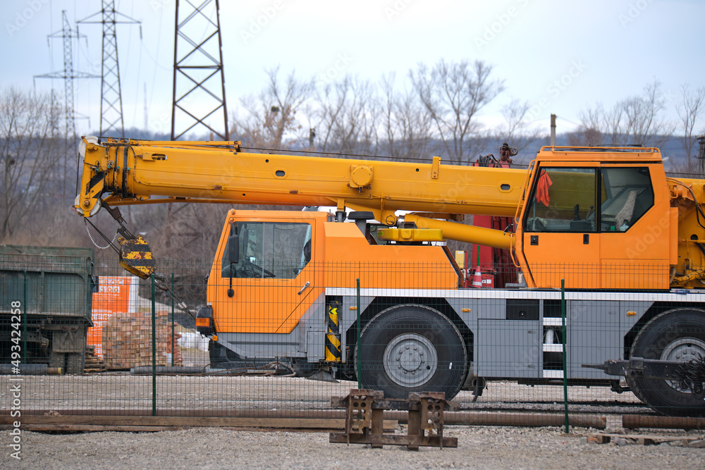 Heavy duty mobile lifting crane at construction site