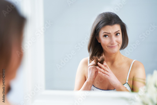Free Download Young nice brunette woman in the bathroom haircare - GFXLoad