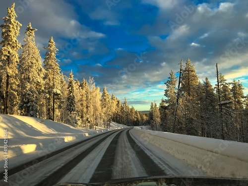 A beautiful road in finish Lapland during sunrise photo