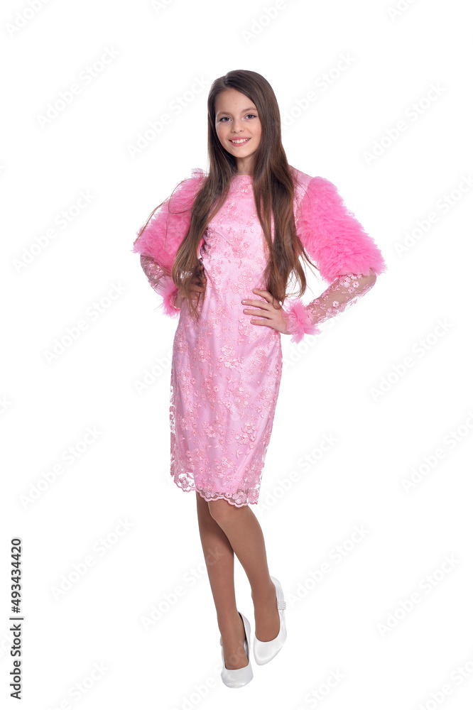 Happy little girl in dress posing on white background Happy little girl in dress posing on white background