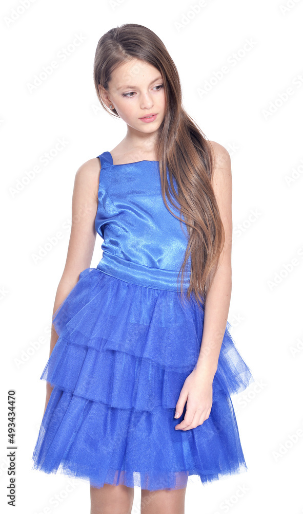 Happy little girl in dress posing on white background Happy little girl in dress posing on white background
