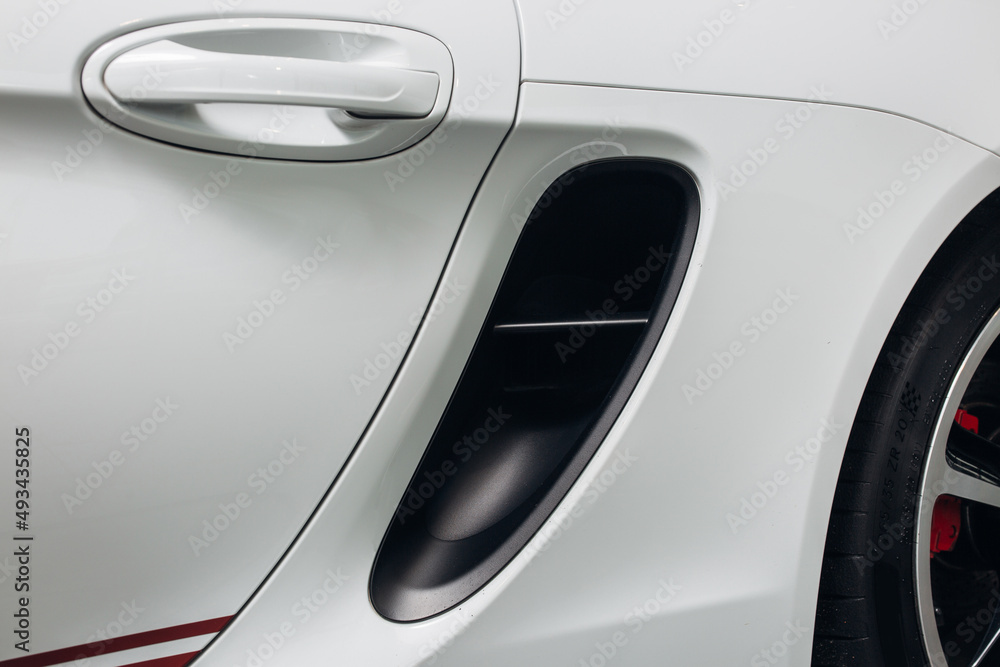 The air intake of a sports car on the fender The air intake of a sports car on the fender