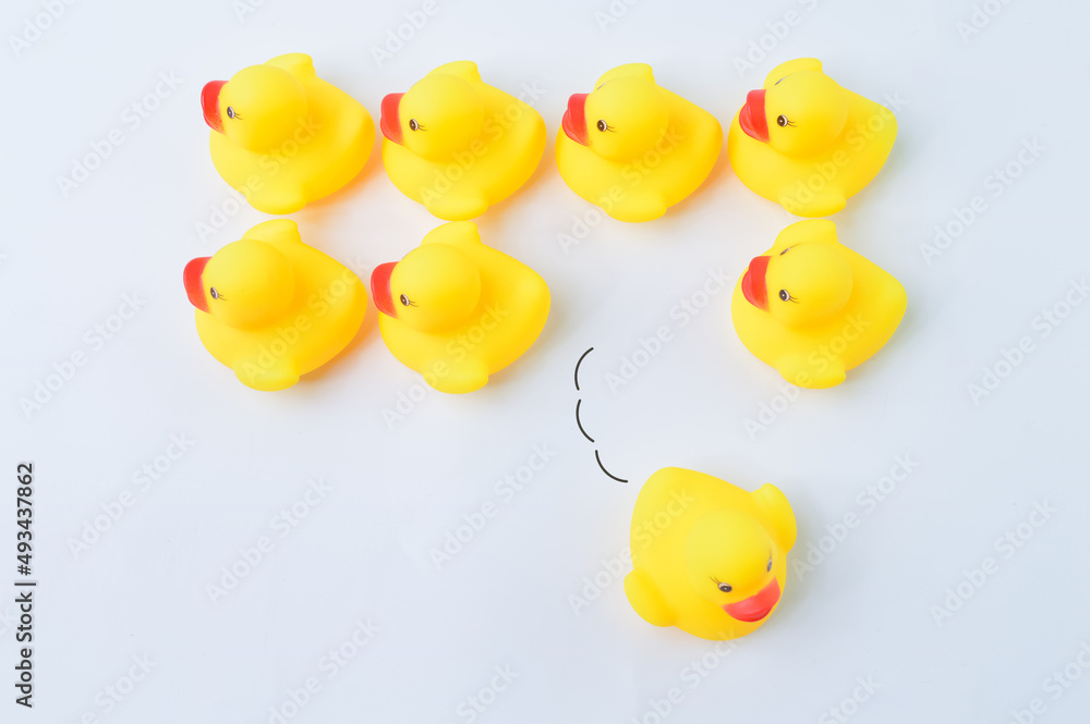Toy duck heading with different directions. Business innovation and unique idea concept. Toy duck heading with different directions. Business innovation and unique idea concept.