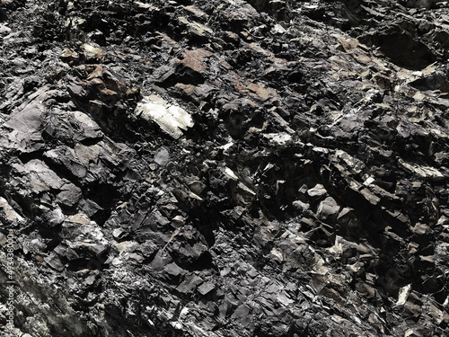 black stone wall for graphic design or wallpaper.