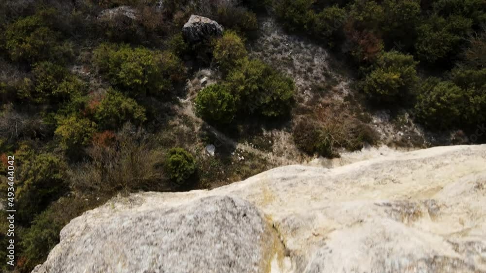 Cinematic flight over the edge of a large cliff. White rock. Dangerous flight. Cinematic flight over the edge of a large cliff. White rock. Dangerous flight.