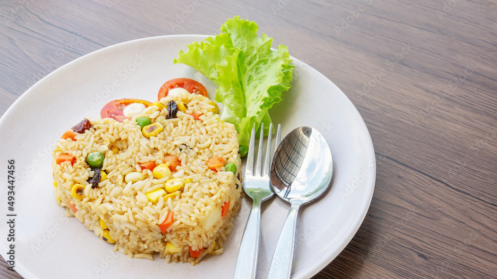 Fried rice with cereal on a wooden table. Fried rice with cereal on a wooden table.
