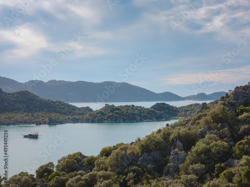 Travel and tourist attractions at Kekova island, Turkey. beautiful view of seascape from Kalekoy Village, Demre, View with boat and islands in sea