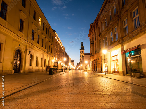 Grodzka Street in Kraków by night. One of the oldest streets of Krakow, Poland. Part of historical Royal Route from Main Market Square to the Wawel Castle.