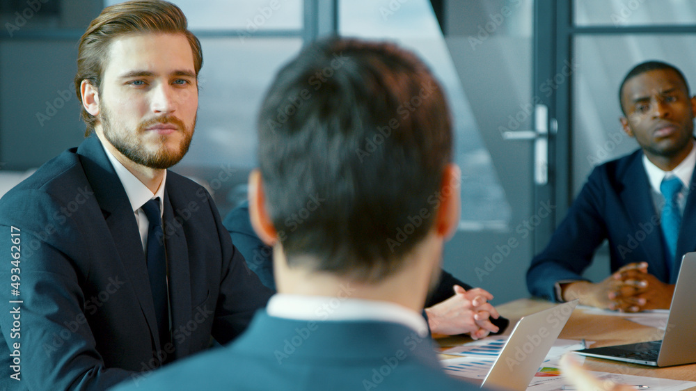 Corporate business team in a meeting with a manager. Young group of diverse people Corporate business team in a meeting with a manager. Young group of diverse people