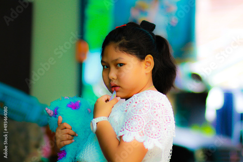Asian girl walking in the backyard