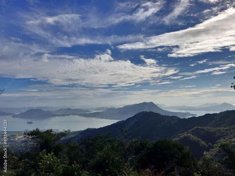 It is a mountain of Omishima overlooking the Seto Inland Sea. clouds over the mountains