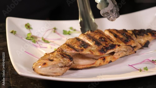 Baked hosper trout on a plate