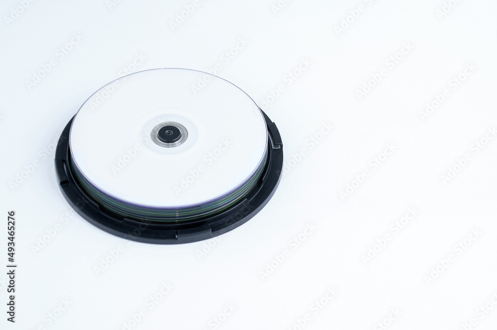 Compact discs blanks close-up. White background. Compact discs blanks close-up. White background.