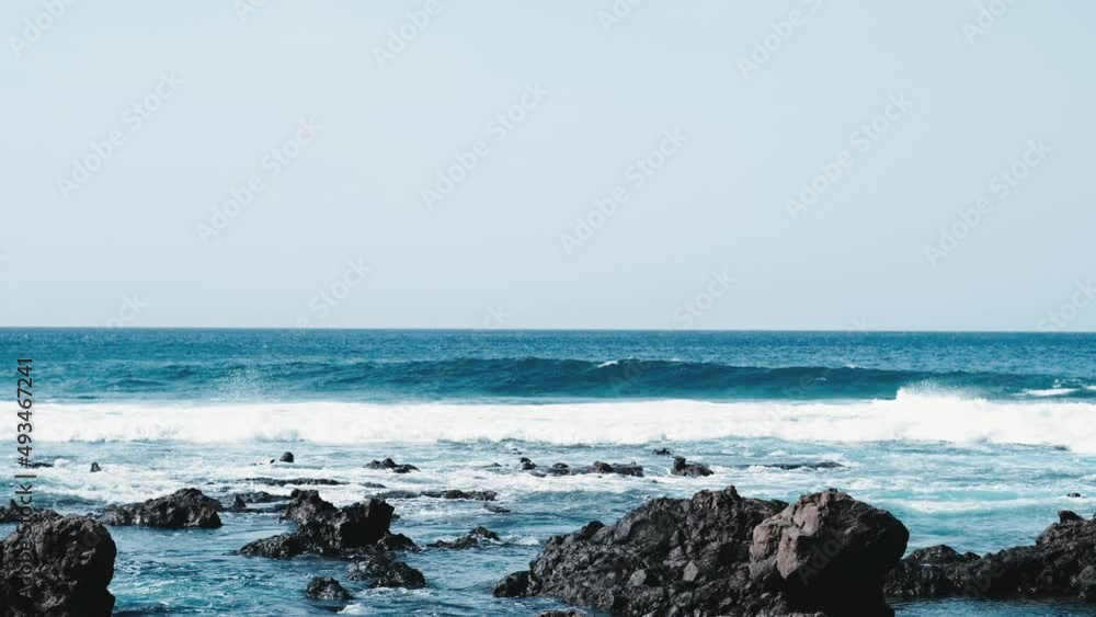 Awesome power waves breaking over dangerous rocks Awesome power waves breaking over dangerous rocks