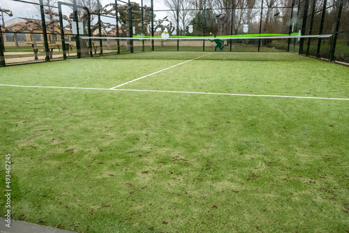 Artificial grass paddle tennis court dirty due to lack of use