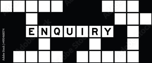 Alphabet letter in word enquiry on crossword puzzle background