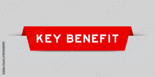 Red color inserted label with word key benefit on gray background