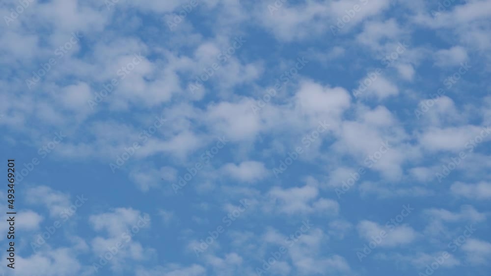 Full Frame shot of clouds in the blue sky. Natural sky background. Clouds against the blue sky during the noon. Full Frame shot of clouds in the blue sky. Natural sky background. Clouds against the blue sky during the noon.