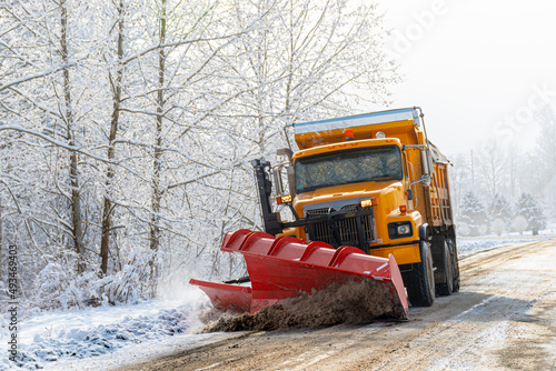 A Yellow Township snowplow removes the snow that fell last night on Seward Road in Windsor in Upstate NY. photo