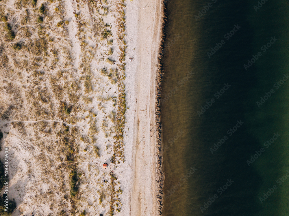 Aerial view of the sandy sea beach. Holidays at sea