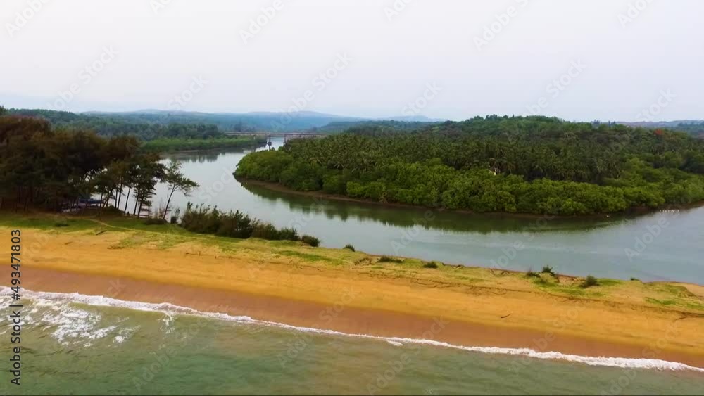 A drone capturing the river and the beach of Galgibagh in south Goa, India. A drone capturing the river and the beach of Galgibagh in south Goa, India.