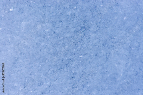 blue snow texture close-up. Snow background