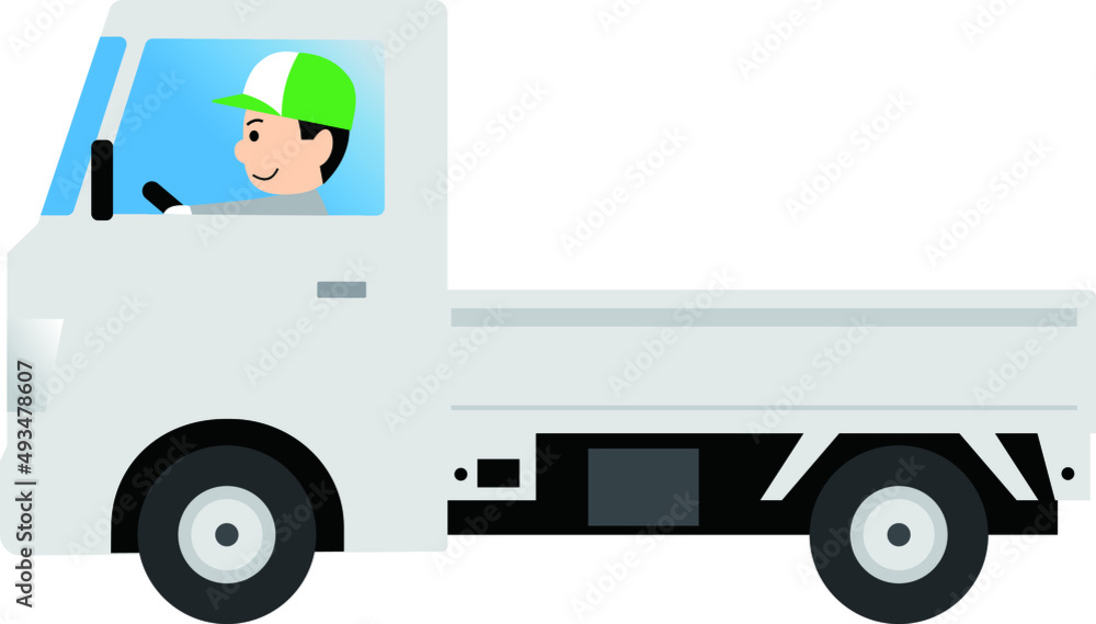 軽トラックを運転する男性 軽トラックを運転する男性