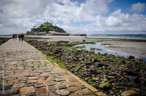 May 25th 2021 Marazion, Cornwall, England, UK - Pathway towards St. Michael's Mount, low tide, people around