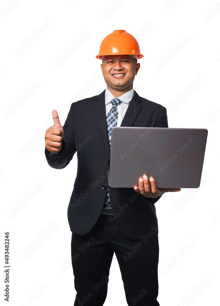 Portrait of a handsome chief engineer wearing a black suit and orange helmet holding a laptop isolated on white background, with clipping path.