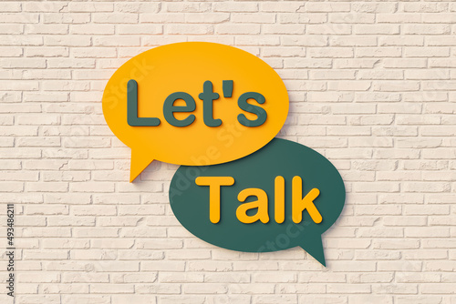 Let's talk. Sign, speech bubble, text in yellow and dark green against a brick wall. Message, Phrase, Information and saying concepts. 3D illustration