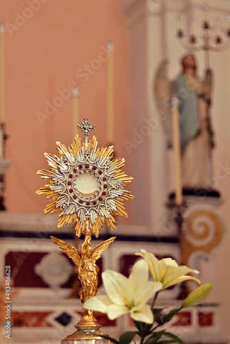 Ostensorial adoration - Monstrance (Ostensory) with the (Eucharist) Blessed Sacrament - The Host bears the inscription JHS, monogram of the name of Jesus
