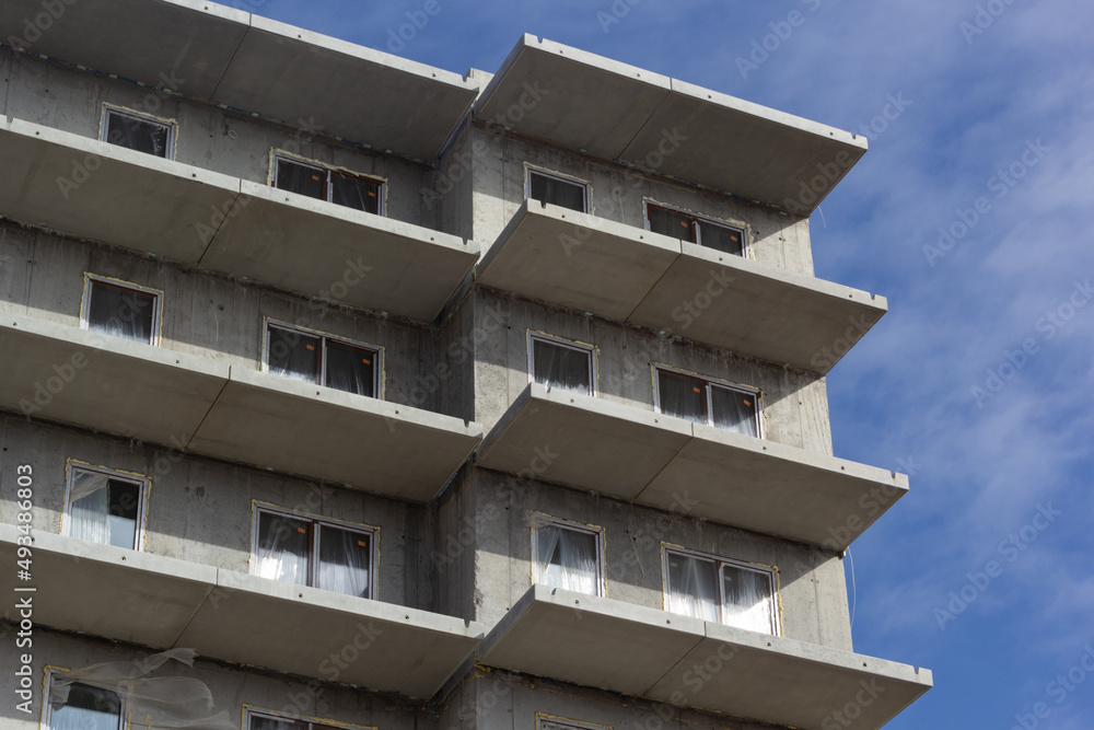 Closeup of a new residential building under construction.