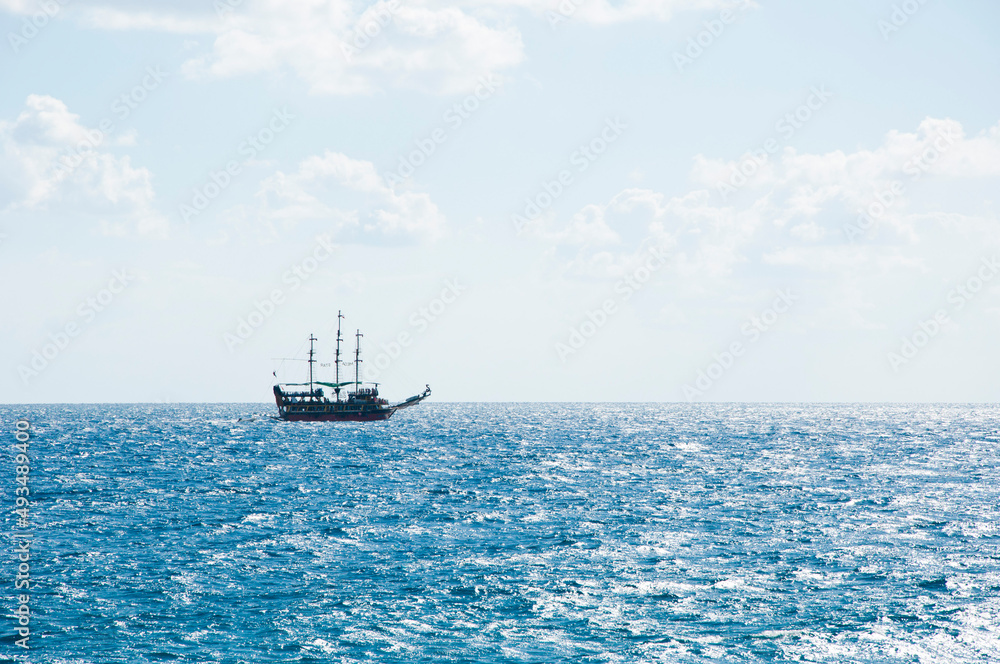 pirate ship in the sea water. summer vacation and traveling. copy space pirate ship in the sea water. summer vacation and traveling. copy space