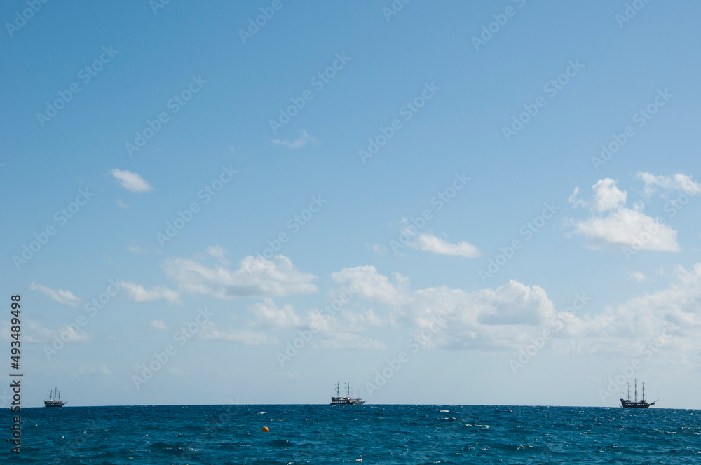 ship and boat in ocean. summer travel and vacation
