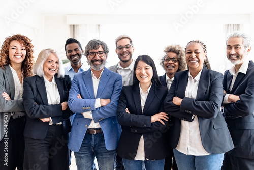 Business team of multiracial people standing in front of camera during meeting work
