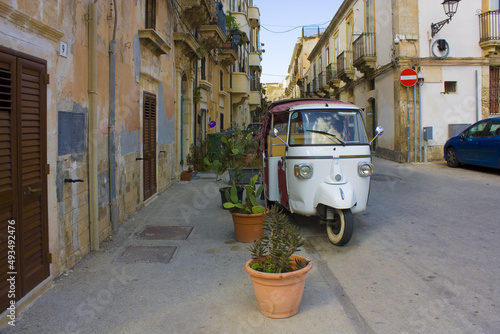 Ape Tuk Tuk in downtown of Syracuse, Sicily, Italy photo