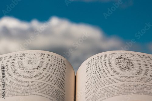 book with the sky as the background