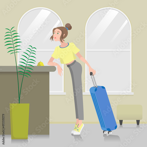 A young girl has arrived at the hotel and is waiting for the staff at the reception.