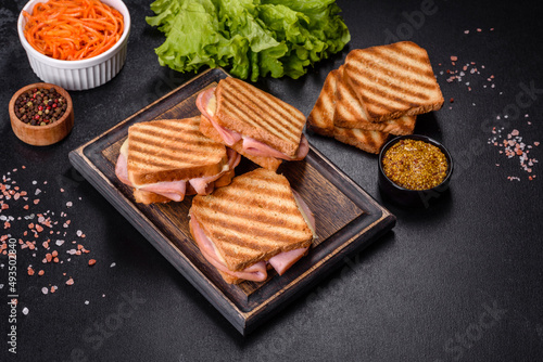 Delicious fresh toast grill with cheese and ham. Sandwiches, quick snack