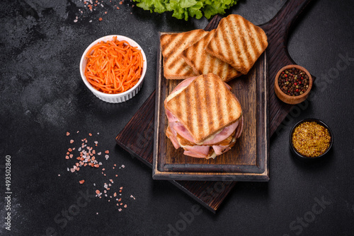 Delicious fresh toast grill with cheese and ham. Sandwiches, quick snack