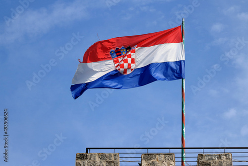 Crotian flag in the wind, Korcula, Croatia photo